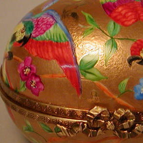 Parrots and butterfly over gold