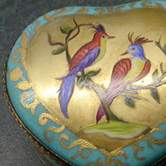 Pair of birds on gold