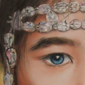 Portrait of a young girl wearing crystals